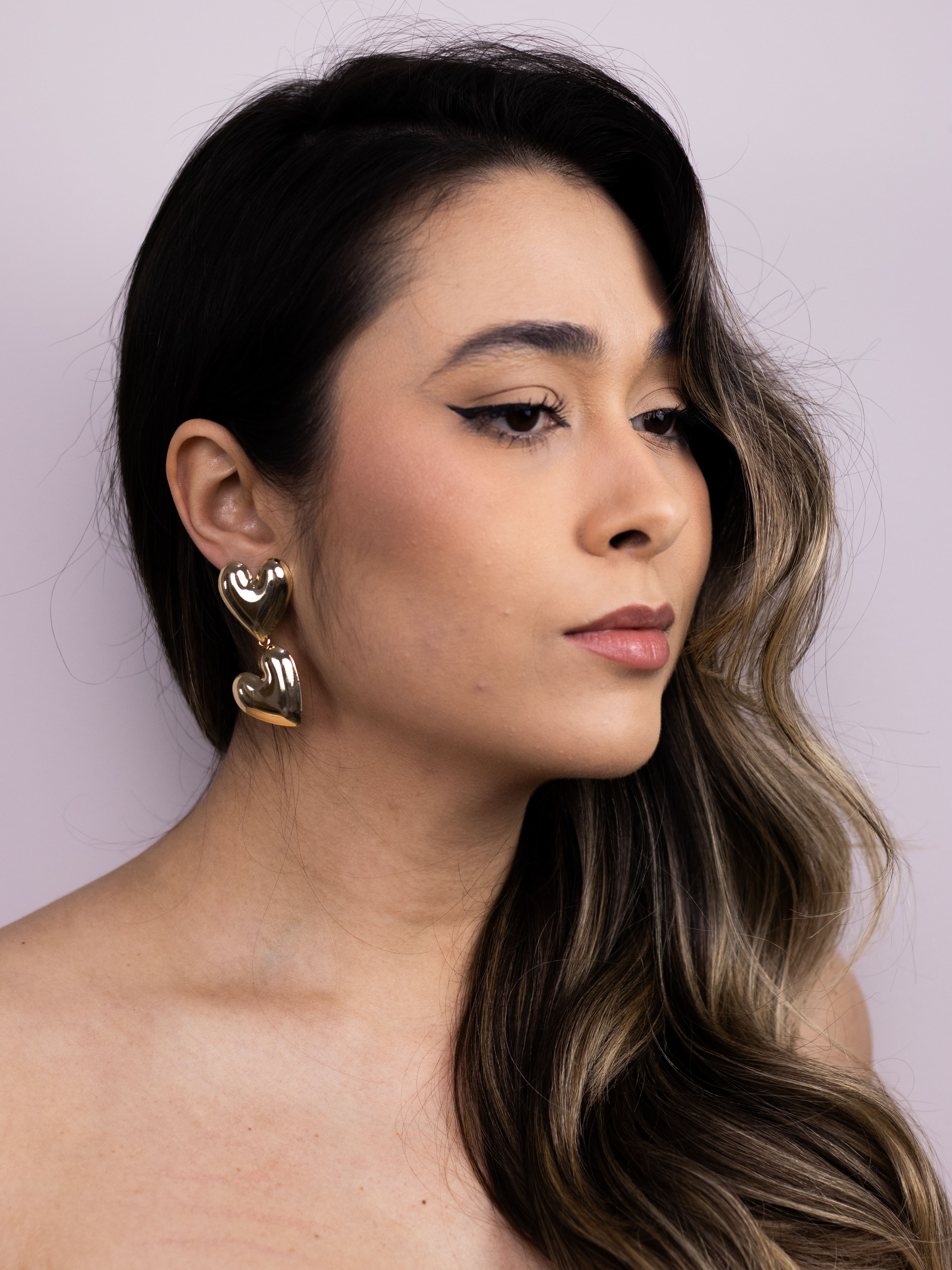 Brinco Metal Dourado Duplo de Coração