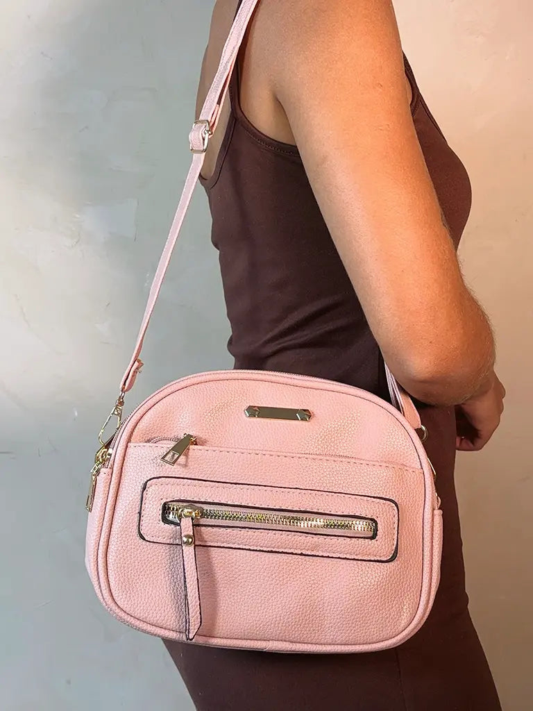 Bolsa Tiracolo Rosa Claro com Bolsos Frontais e Alça Ajustável